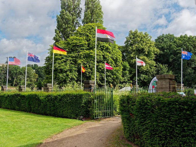 flags of 8 nationalities flying over the entrance to the club during the world under 21 championship