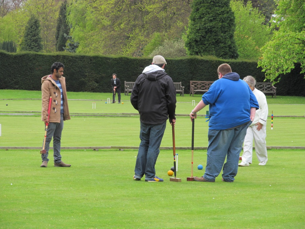 Club members and students in play on the Bowling Greens