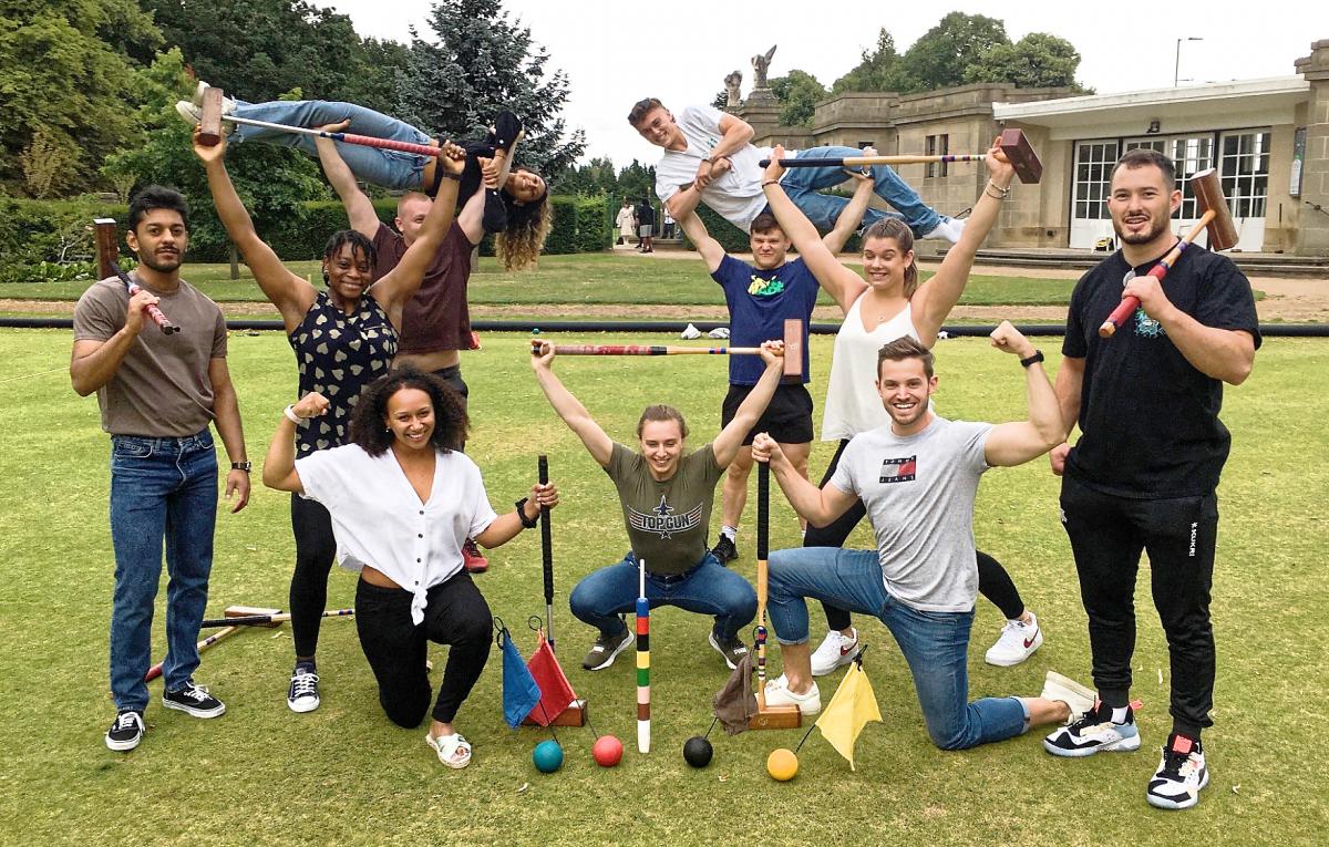 Weightlifters play croquet